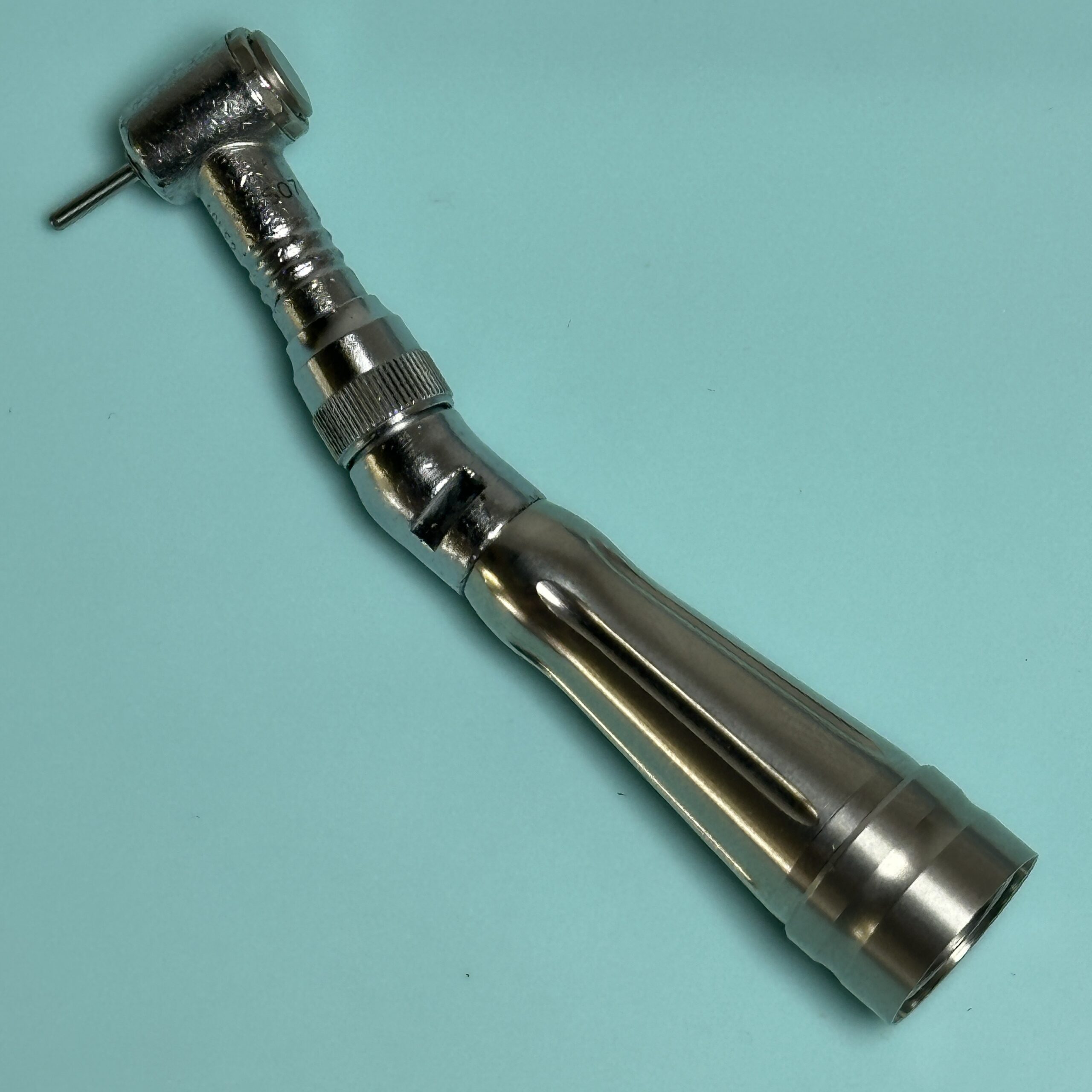 Star Titan Motor to Angle with Friction Grip Head Low Speed Contra Angle Refurbished reconditioned used dental drill from Dental Handpiece Deals USA