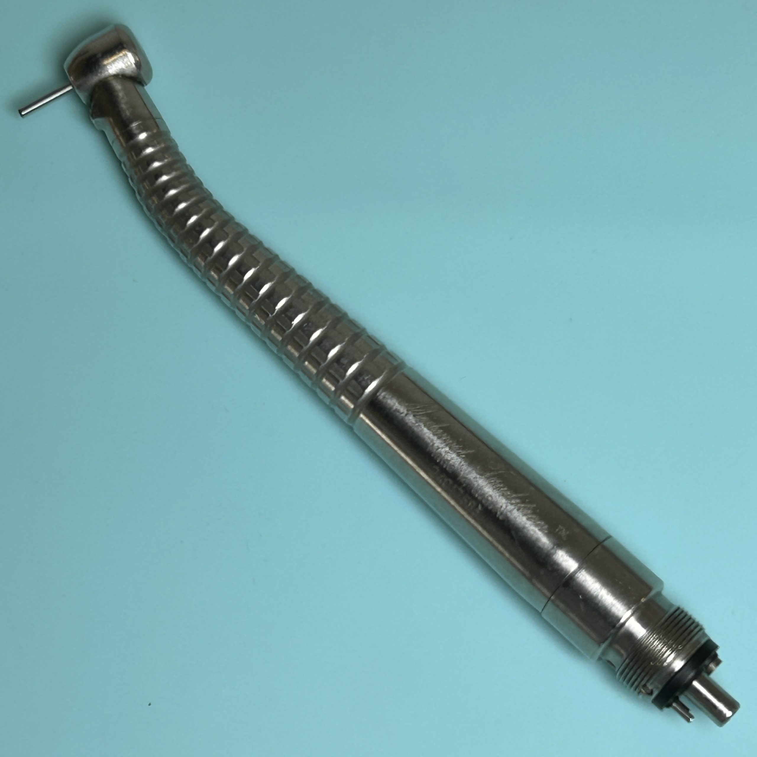 Midwest Tradition Manual Fiber Optic High Speed Handpiece with Bad Optics Refurbished reconditioned used dental drill from Dental Handpiece Deals USA